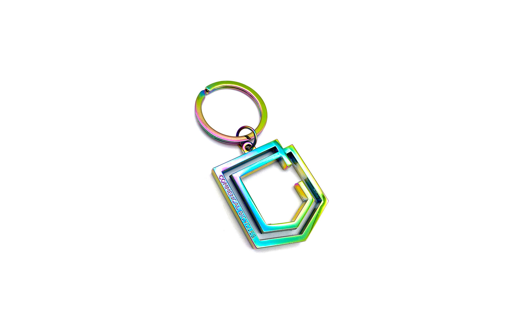 LLAVERO COMMENCAL SHIELD METAL OIL SLICK image number 0
