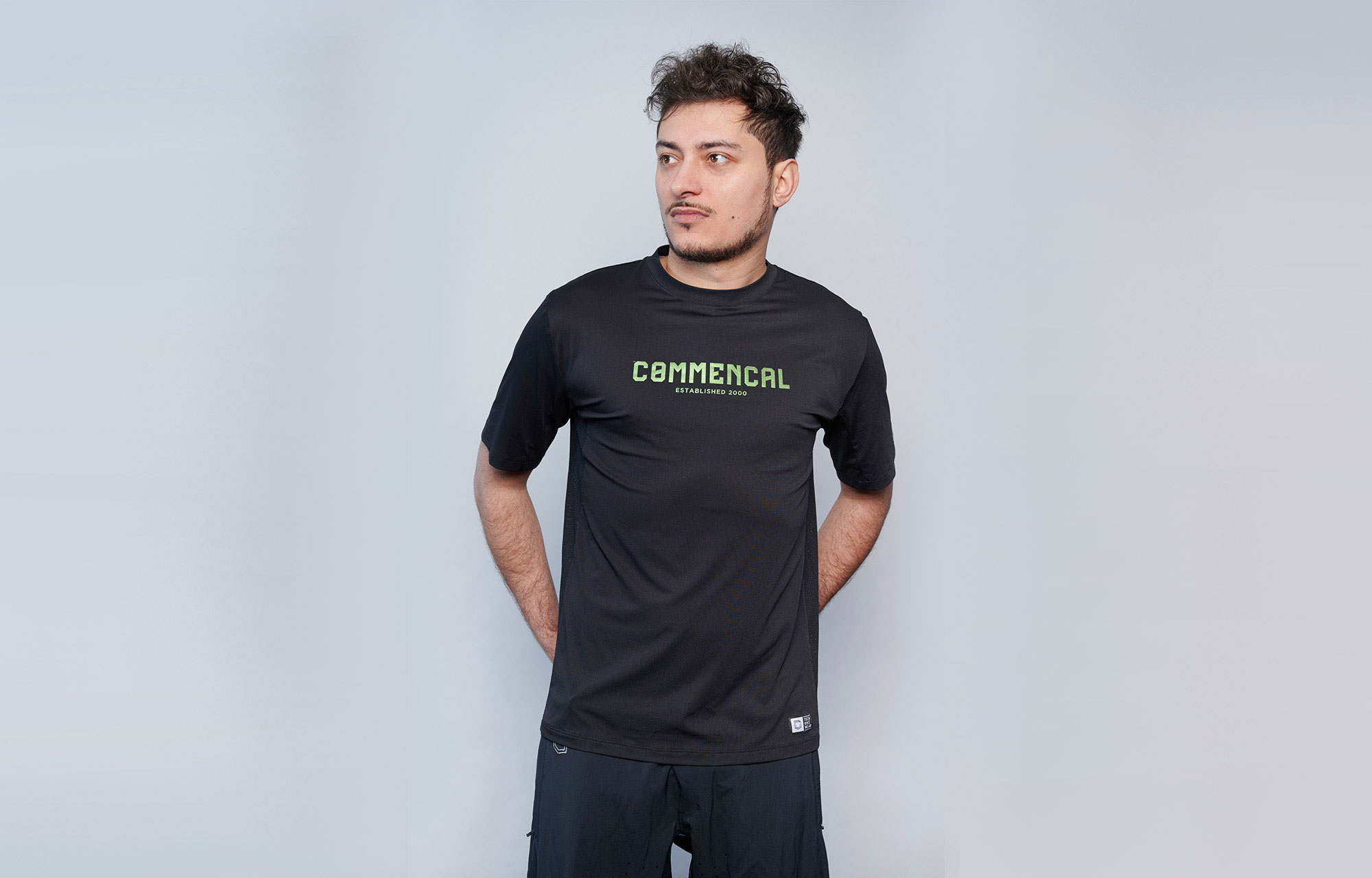 COMMENCAL CORPORATE SHORT SLEEVE JERSEY BLACK AND ELECTRIC GREEN image number 0